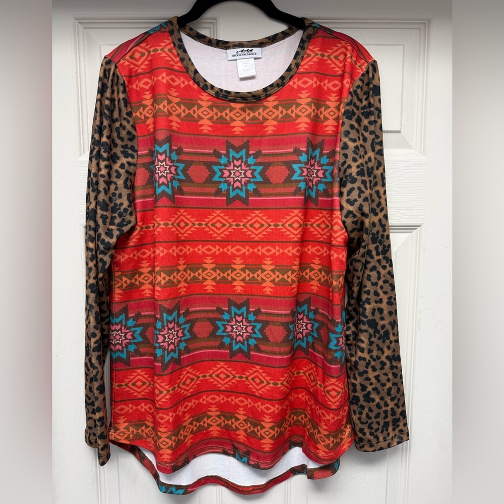 Back in the saddle vibrant print blouse. Definitely a statement top.